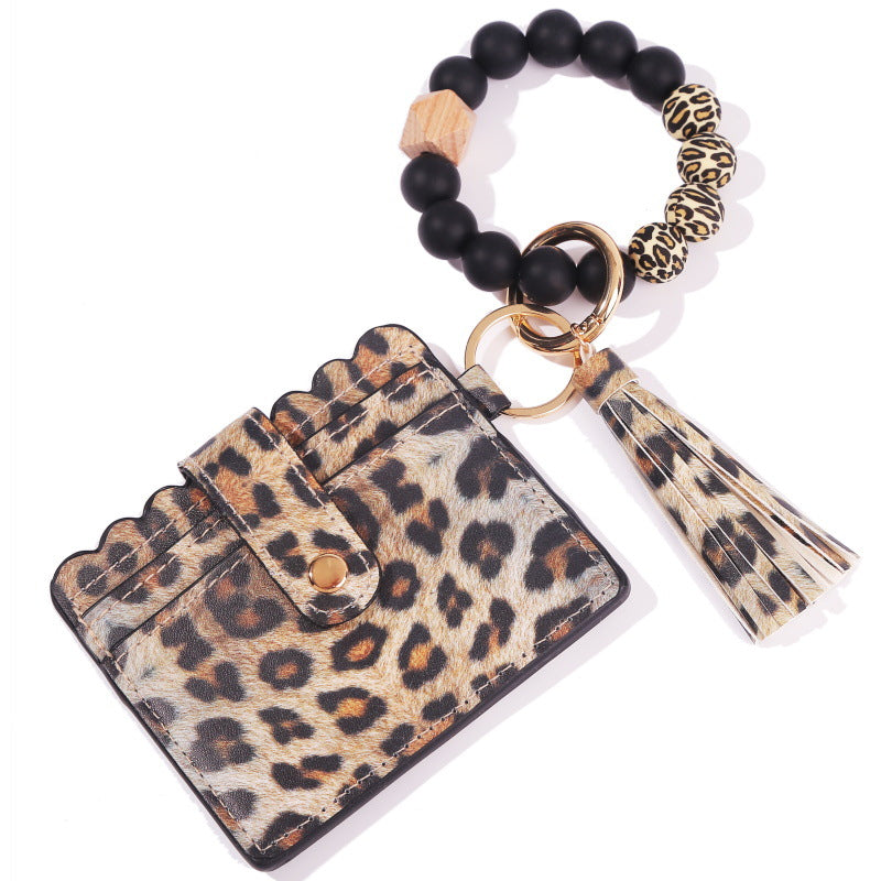 Venta al por mayor MAMA Cow Pattern Card Bag Silicona Beaded Wrist Key Chain